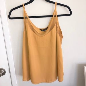 Mustard tank top with mesh neckline